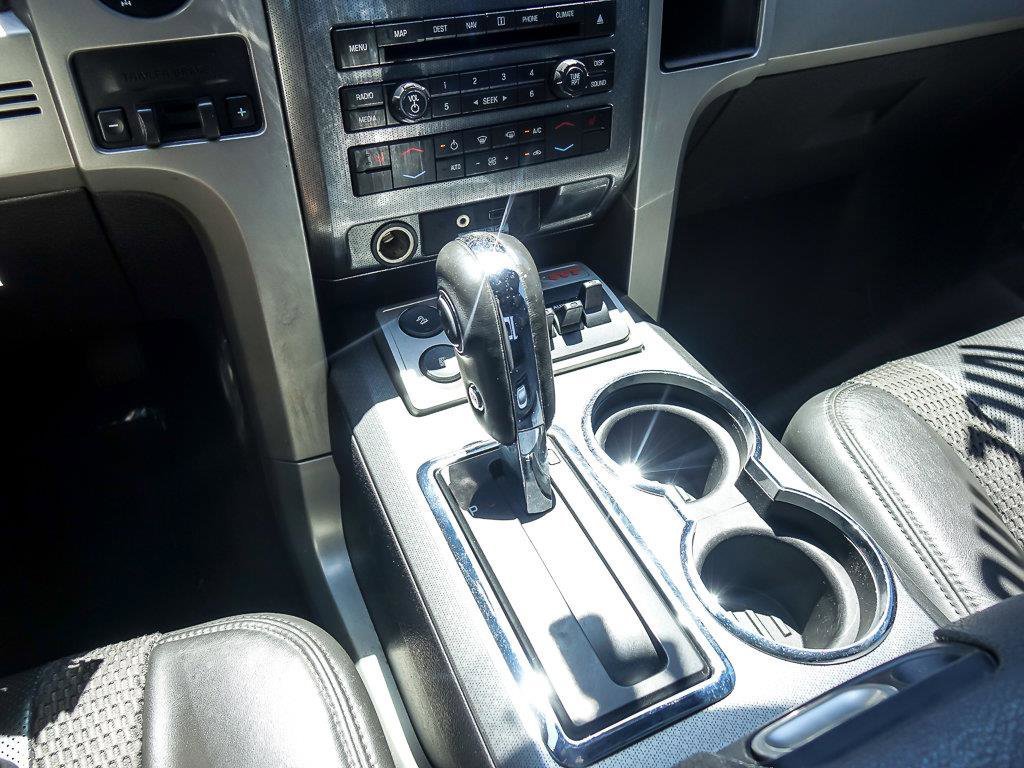 Used 2011 Tuxedo Black Metallic Ford SVT Raptor image 24