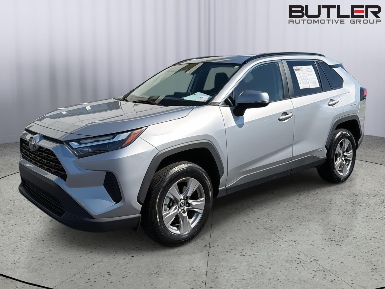 Used 2023 Silver Sky Metallic Toyota Hybrid XLE image 1