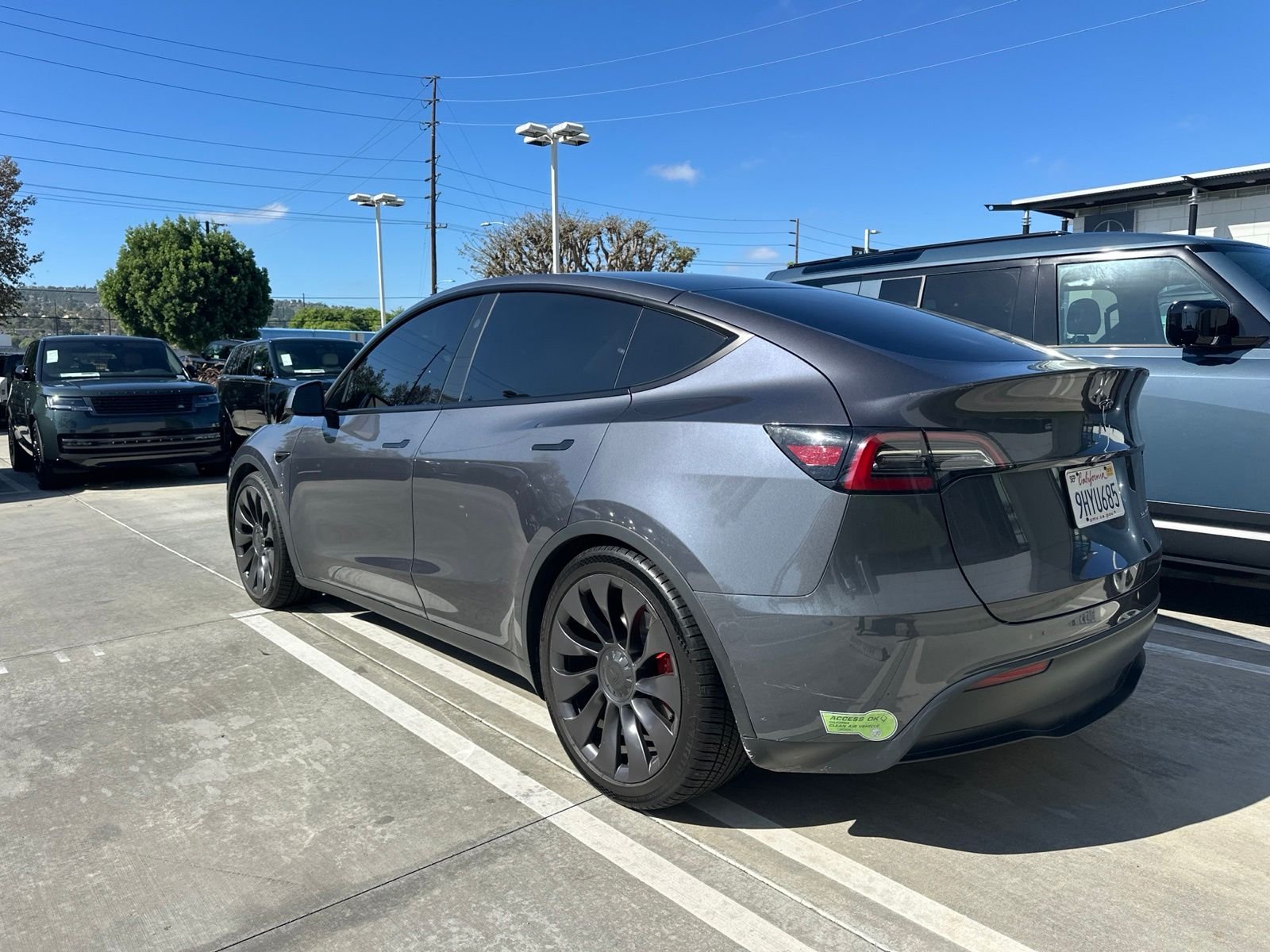 Used 2023 Midnight Silver Metallic Tesla Performance image 4