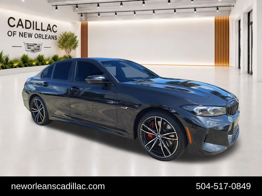 Used 2023 Black BMW 330e iPerformance image 1