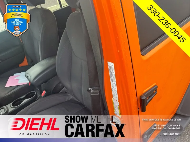 Used 2013 Orange Jeep Unlimited Sport image 13