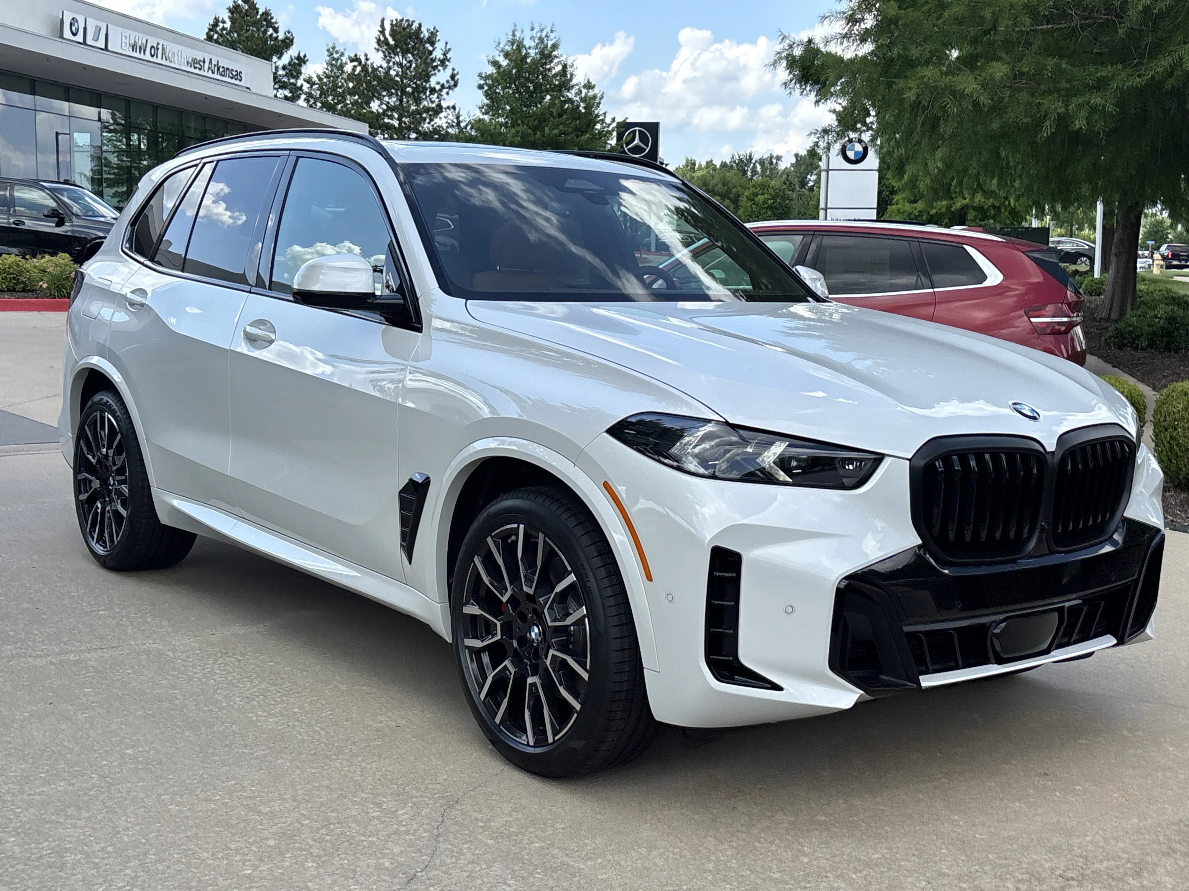 New 2026 MINERAL WHITE BMW xDrive40i image 13