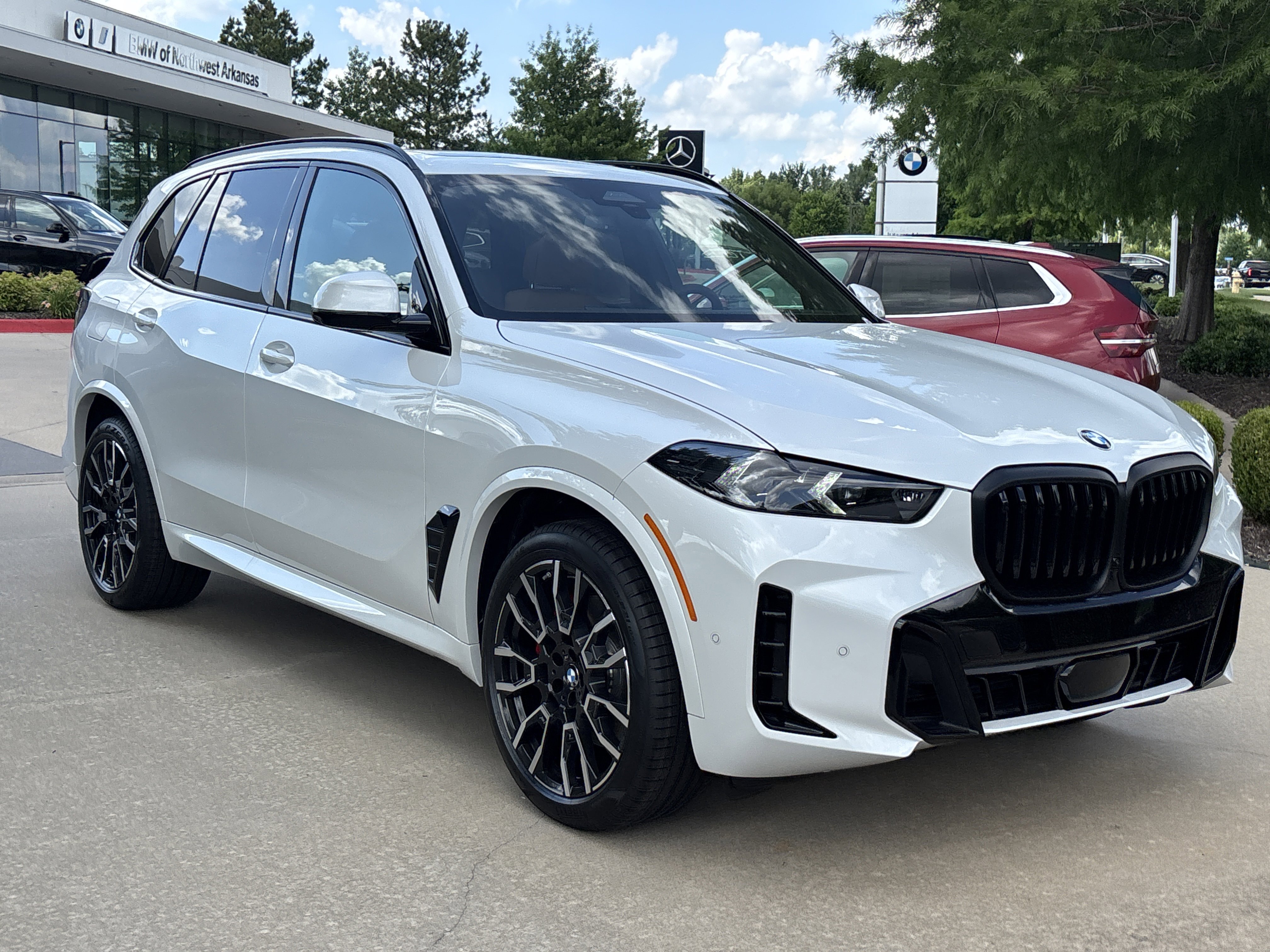 New 2026 MINERAL WHITE BMW xDrive40i image 13