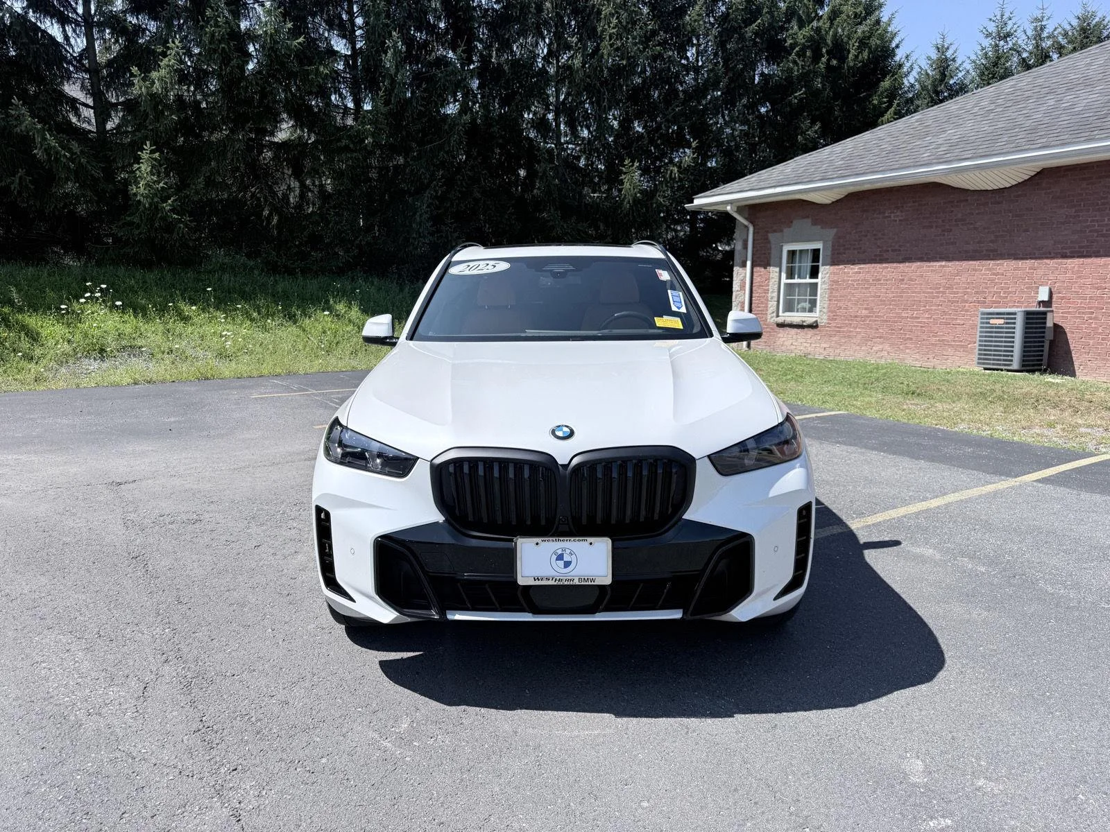 Used 2025 Mineral White Metallic BMW xDrive40i image 2