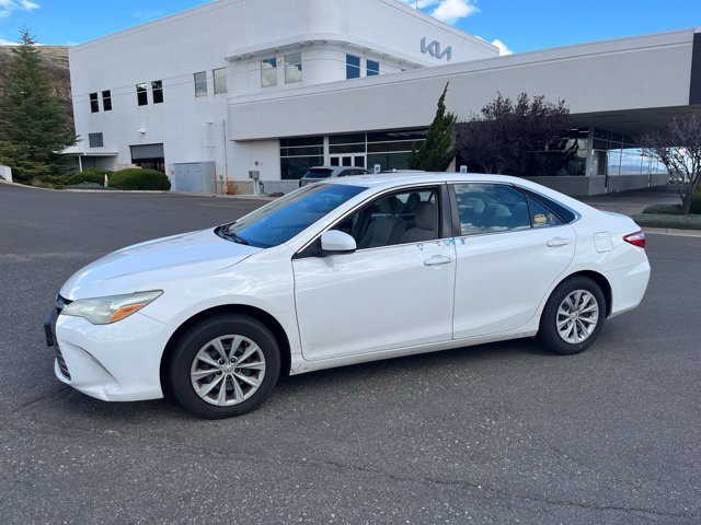 Used 2016 Super White Toyota LE image 1