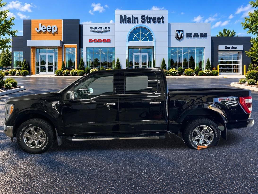 Used 2021 Ford F-150 Lariat with VIN 1FTFW1E88MKE41012 for sale in Kansas City
