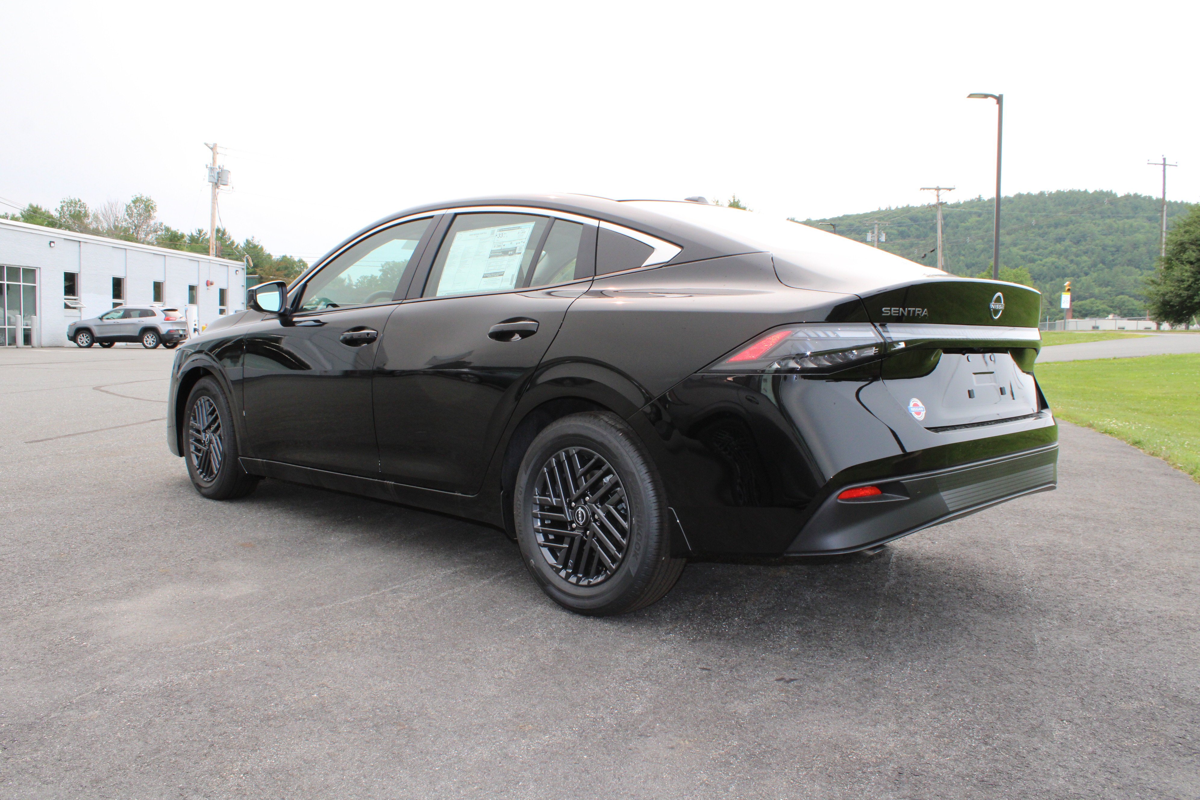 New 2026 Super Black Nissan SV image 3