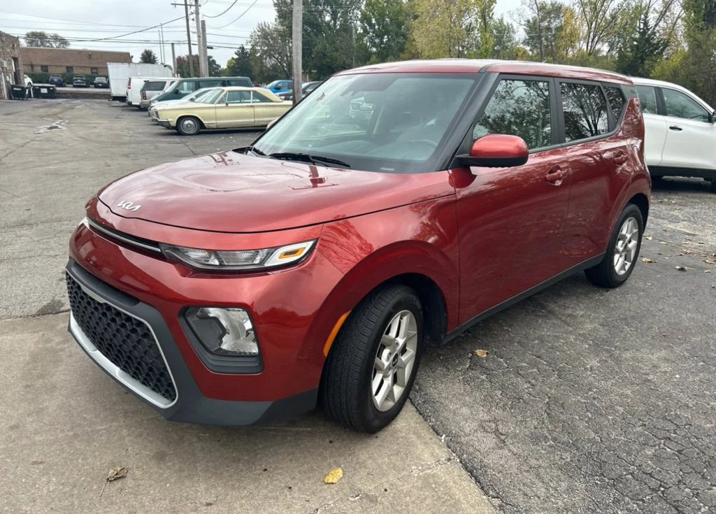 Used 2022 Orange Kia LX image 1
