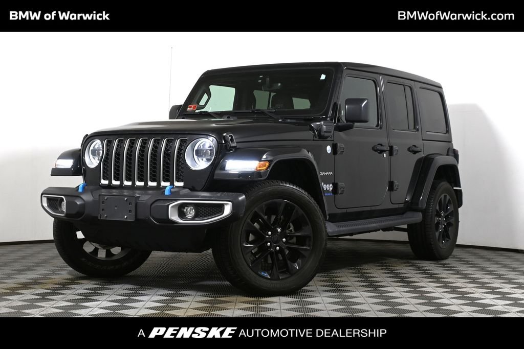 Used 2023 Black Jeep Sahara 4xe image 1