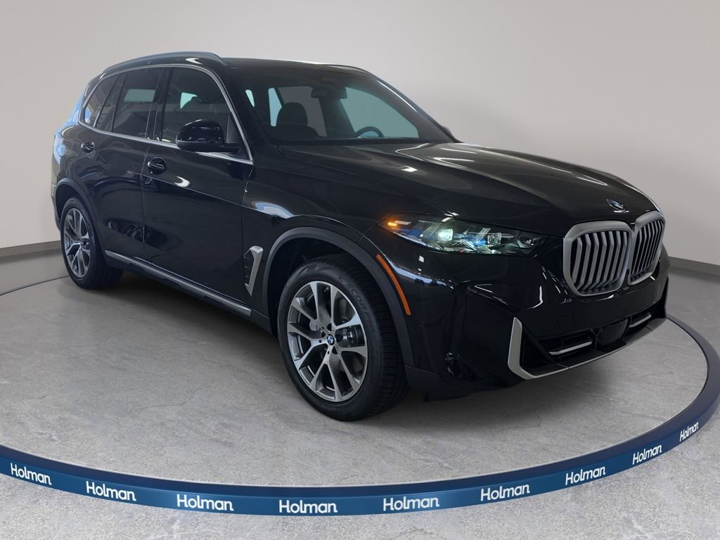 New 2026 Black Sapphire Metallic BMW sDrive40i image 3