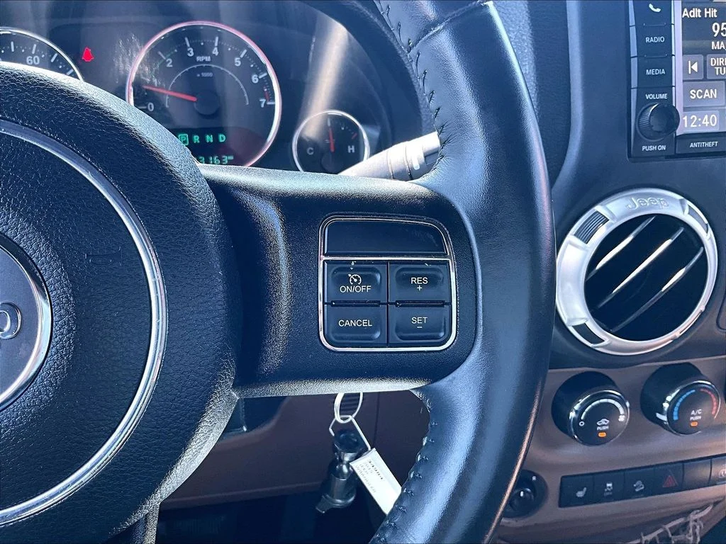 Used 2015 White Jeep Unlimited Sahara image 20