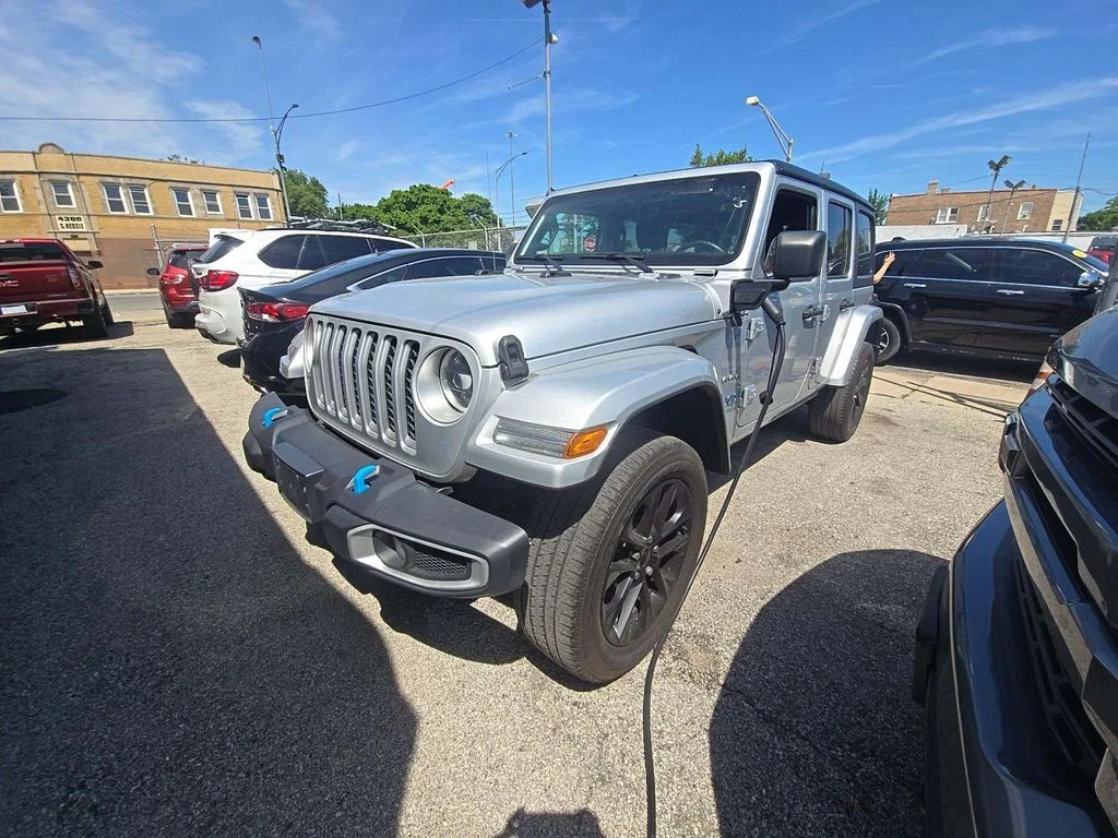 Used 2023 Silver Jeep Sahara 4xe image 1