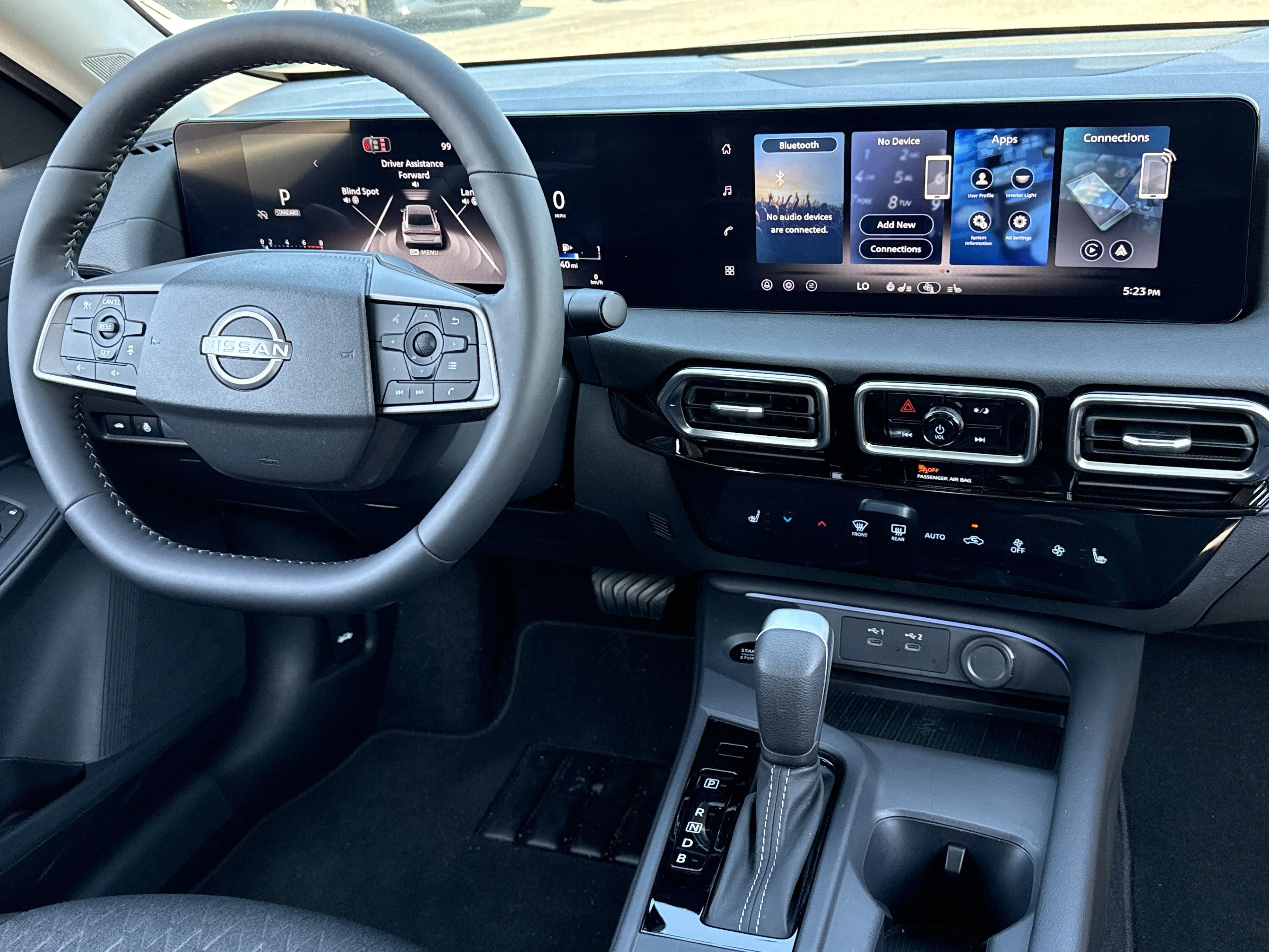 New 2026 Gun Metallic Nissan SV image 3