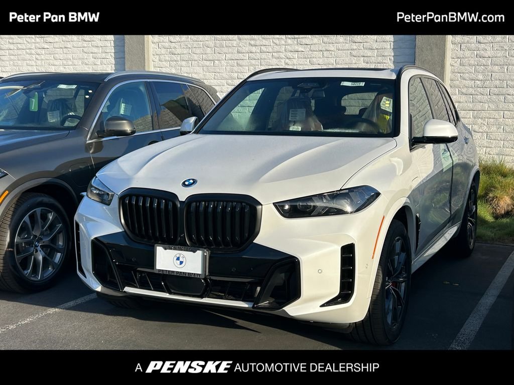New 2026 Mineral White Metallic BMW xDrive50e image 1