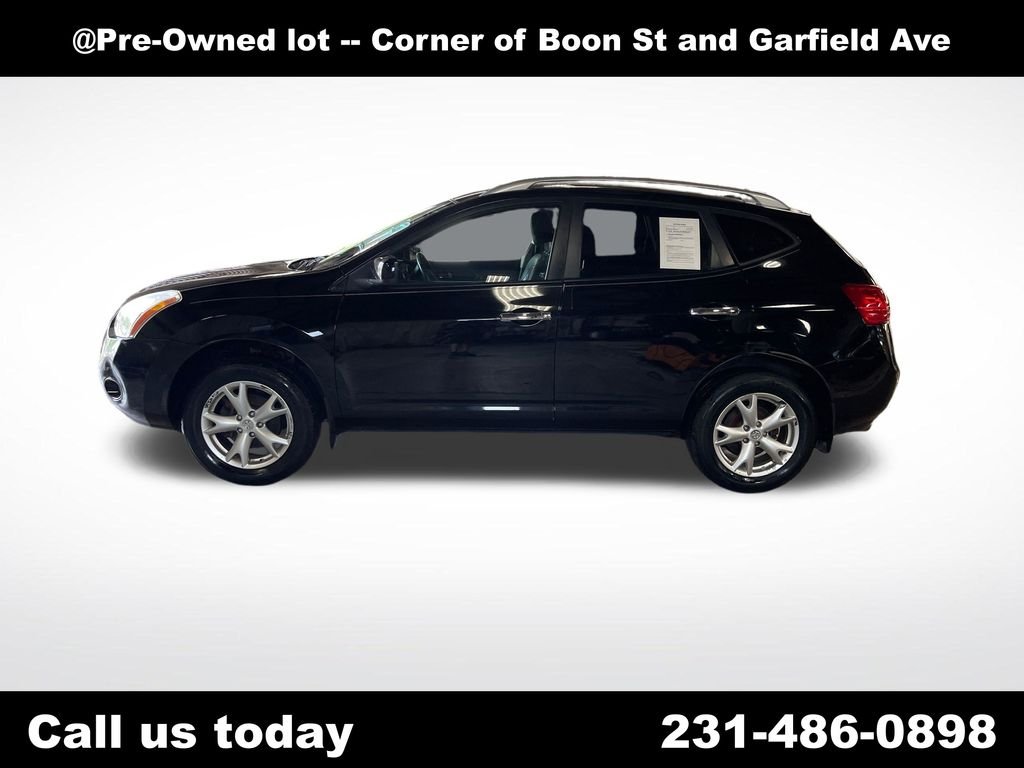 Used 2010 Black Nissan SL image 2