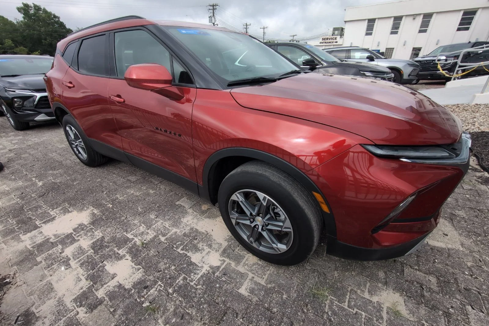 Used 2024 Radiant Red Tintcoat Chevrolet 2LT image 2
