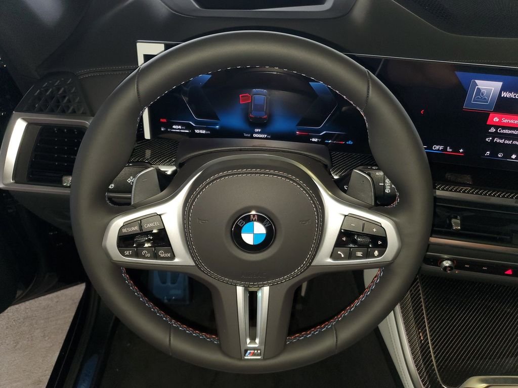 New 2026 Black Sapphire Metallic BMW M60i image 18