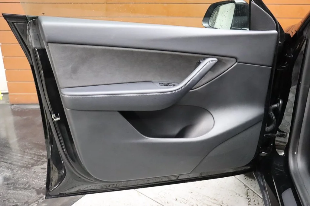 Used 2022 Solid Black Tesla Performance image 39