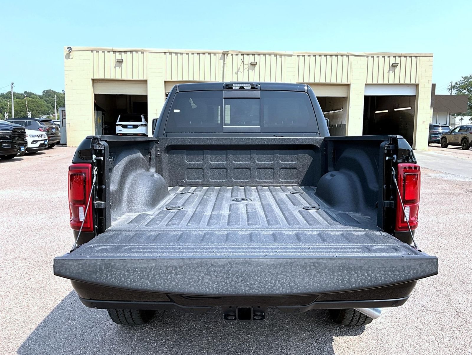 New 2026 Diamond Black Crystal Pearl-Coat Exterior Paint RAM Laramie image 9