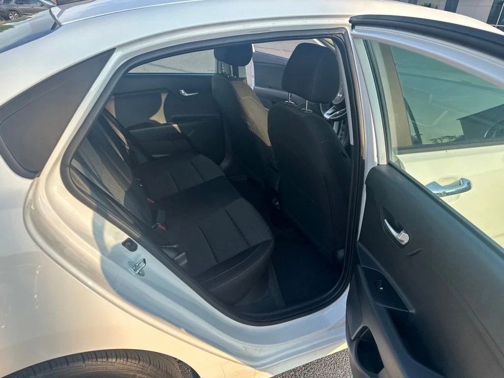 Used 2023 Clear White Kia S image 12