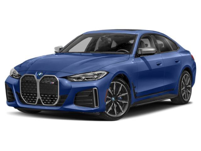Used 2024 Portimao Blue Metallic BMW eDrive40 image 1