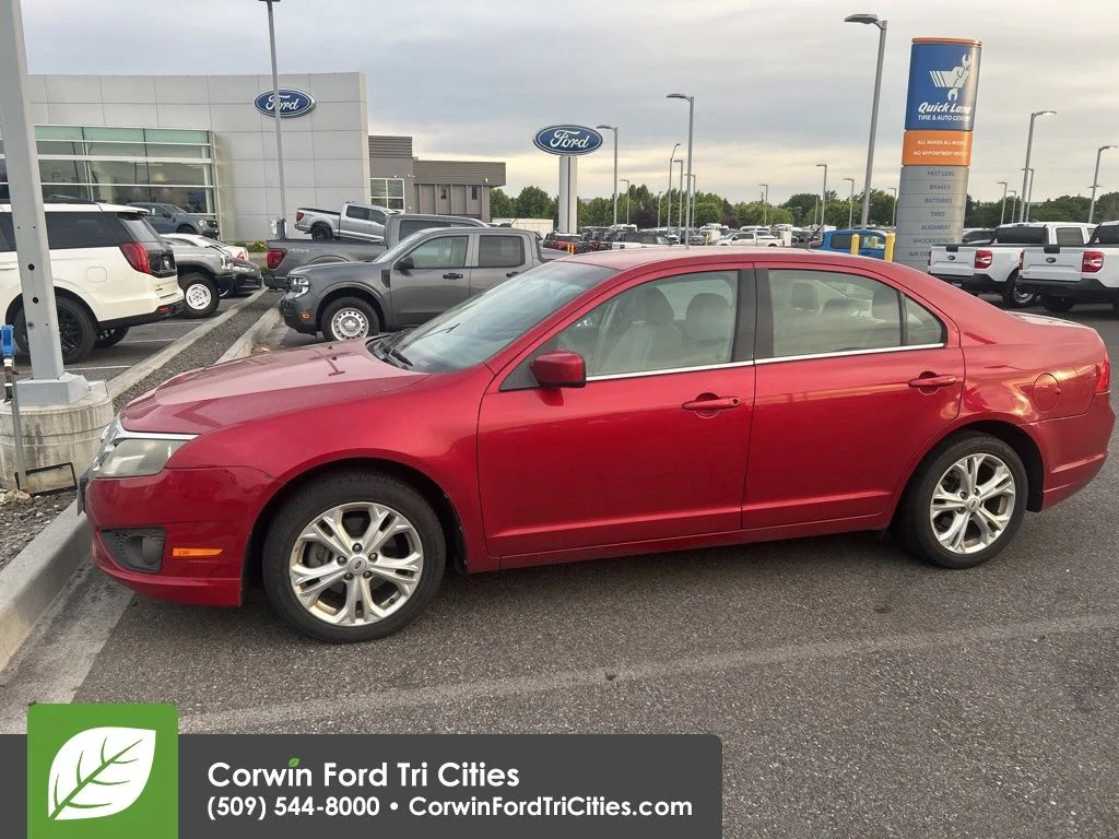 Used 2012 Red Candy Metallic Tinted Clearcoat Ford SE image 6
