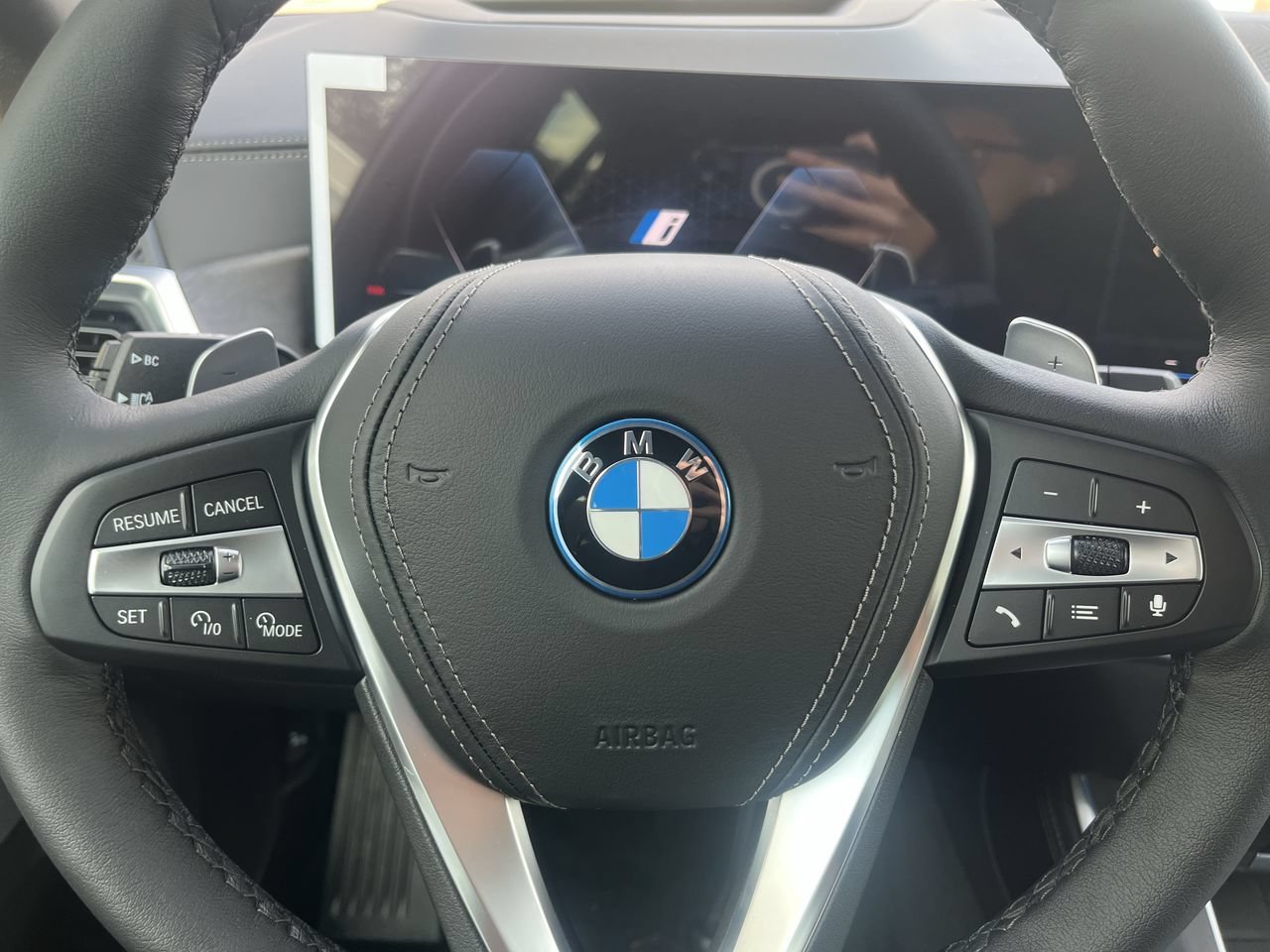 Used 2026 Blue Ridge Mountain Metallic BMW xDrive50e image 22