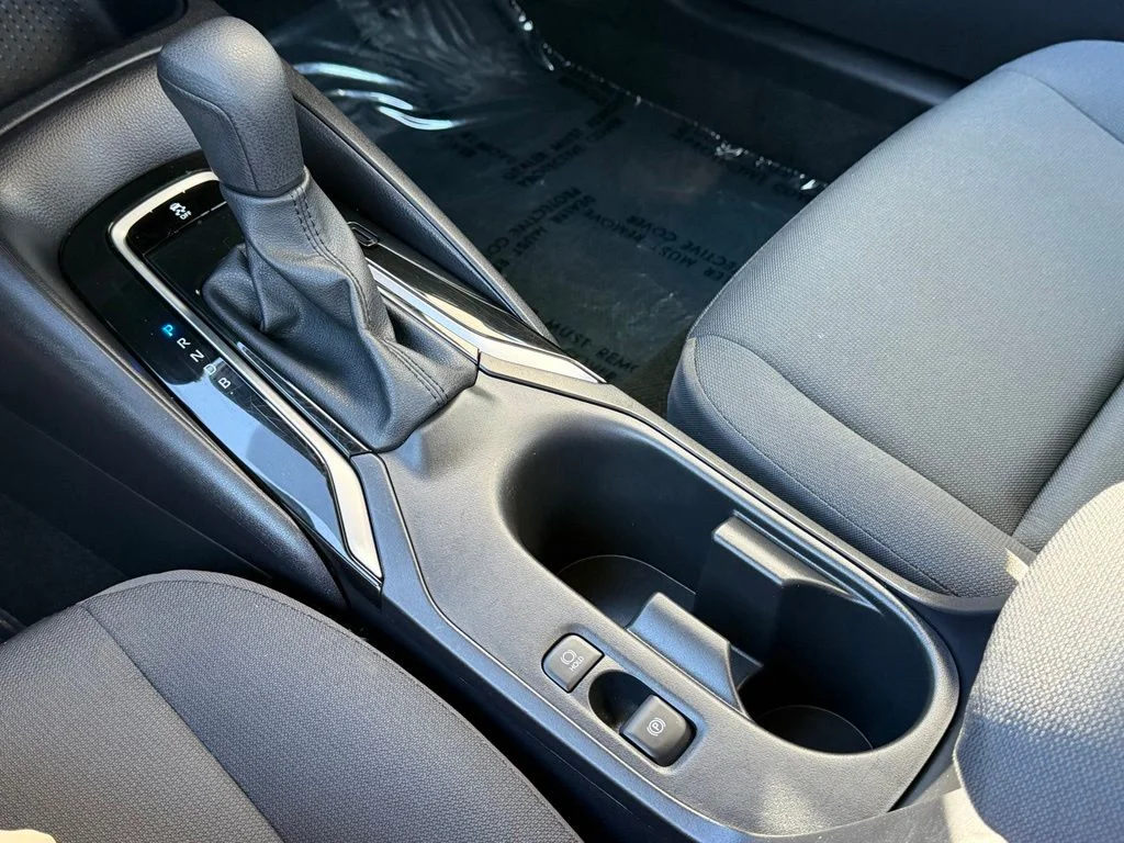 Used 2025 White Toyota LE image 9