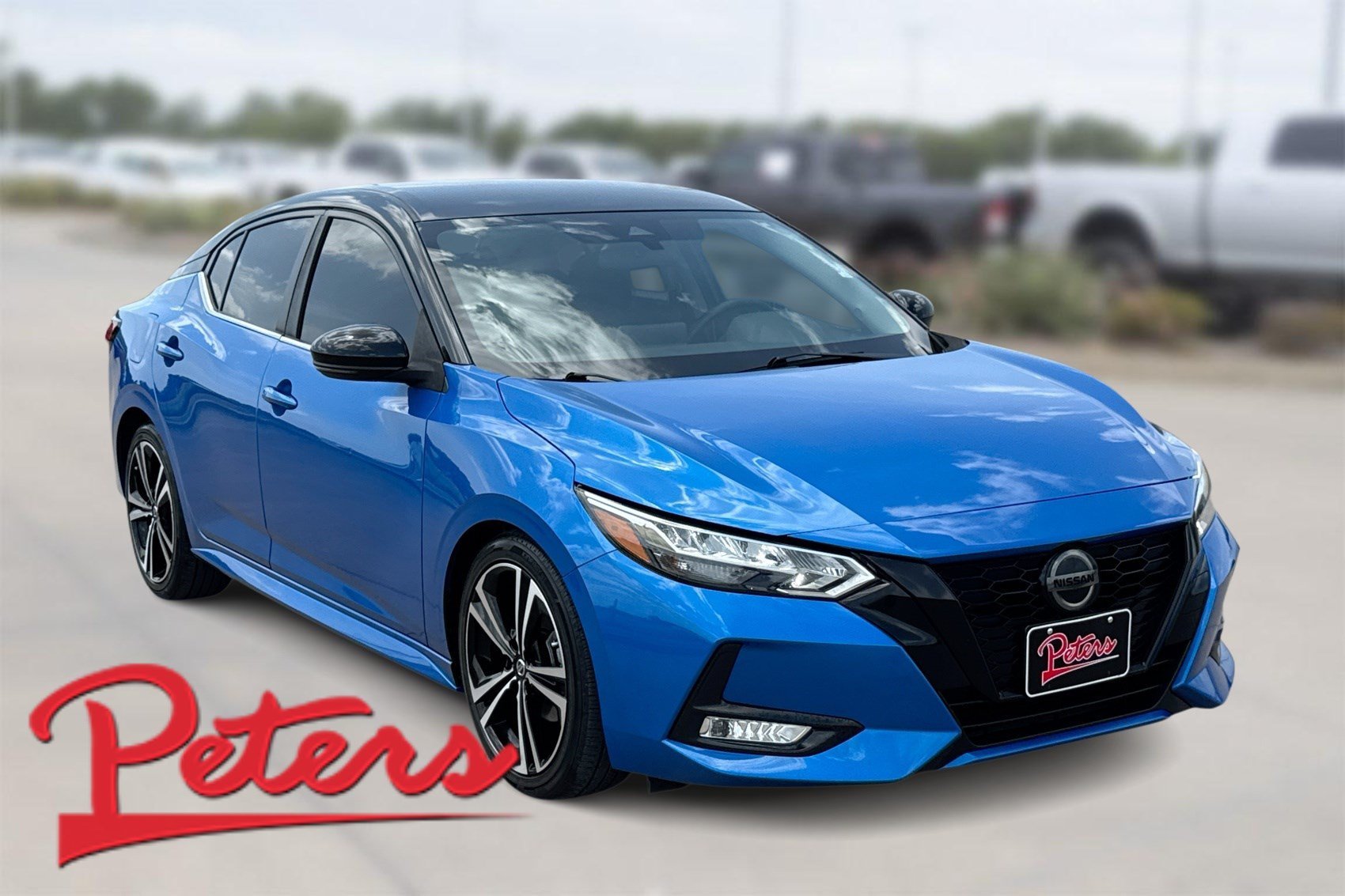 Used 2020 Electric Blue Metallic Nissan SR image 1