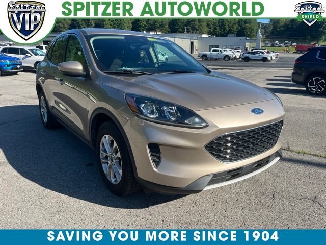 Used 2020 Desert Gold Metallic Ford SE image 1