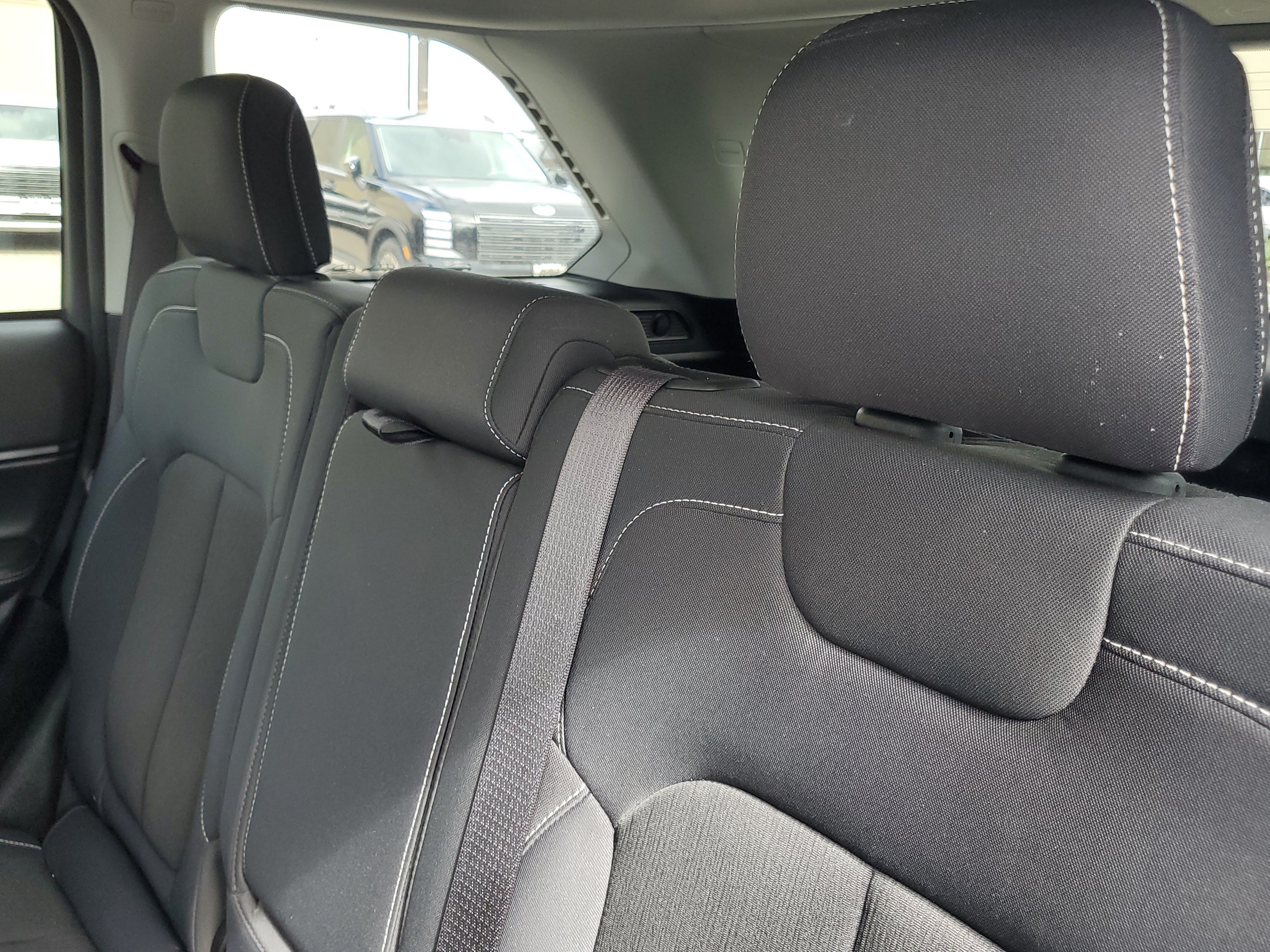 Used 2023 Velvet Red Pearlcoat Jeep Laredo image 14