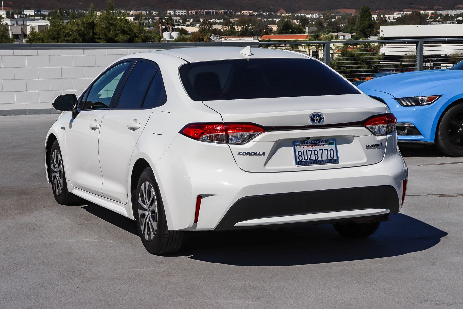 Used 2021 White Toyota LE image 4