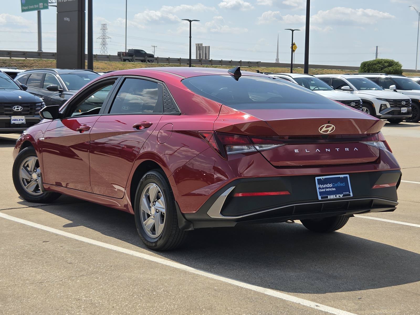 Certified Used 2025 Ultimate Red Hyundai SE image 3