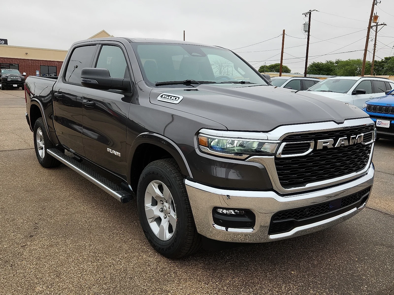 New 2026 Gray Ram LONE STAR CREW CAB 4X2 5