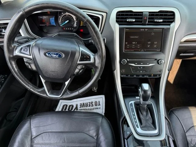 Used 2014 Tuxedo Black Metallic Ford SE image 3