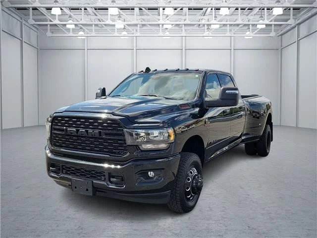 Used 2024 Black Clearcoat RAM Big Horn 4x4 Crew Cab 8 ft. box 169.5 in. WB image 1