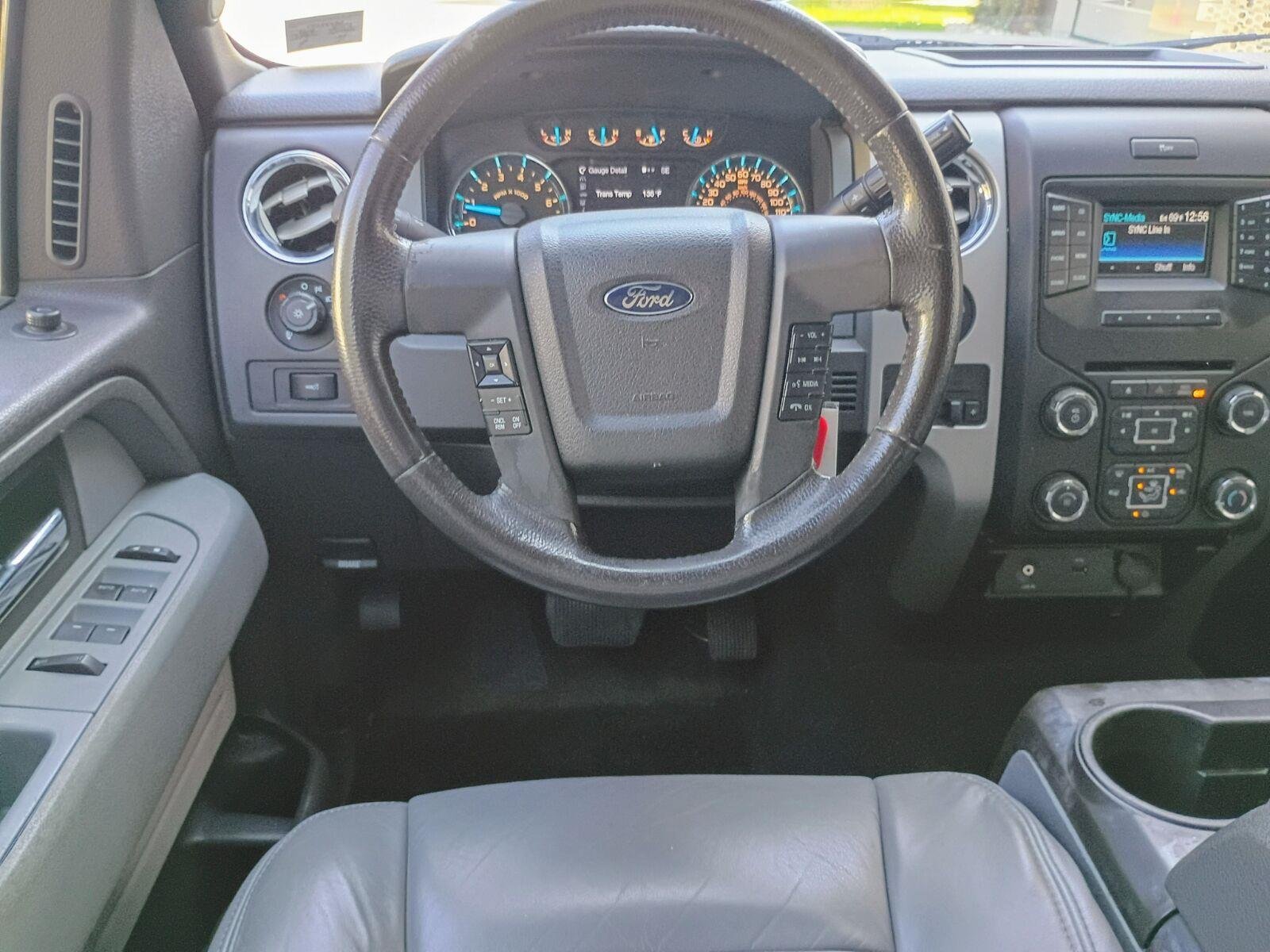 Used 2014 Ruby Red Metallic Tinted Clearcoat Ford XLT image 11