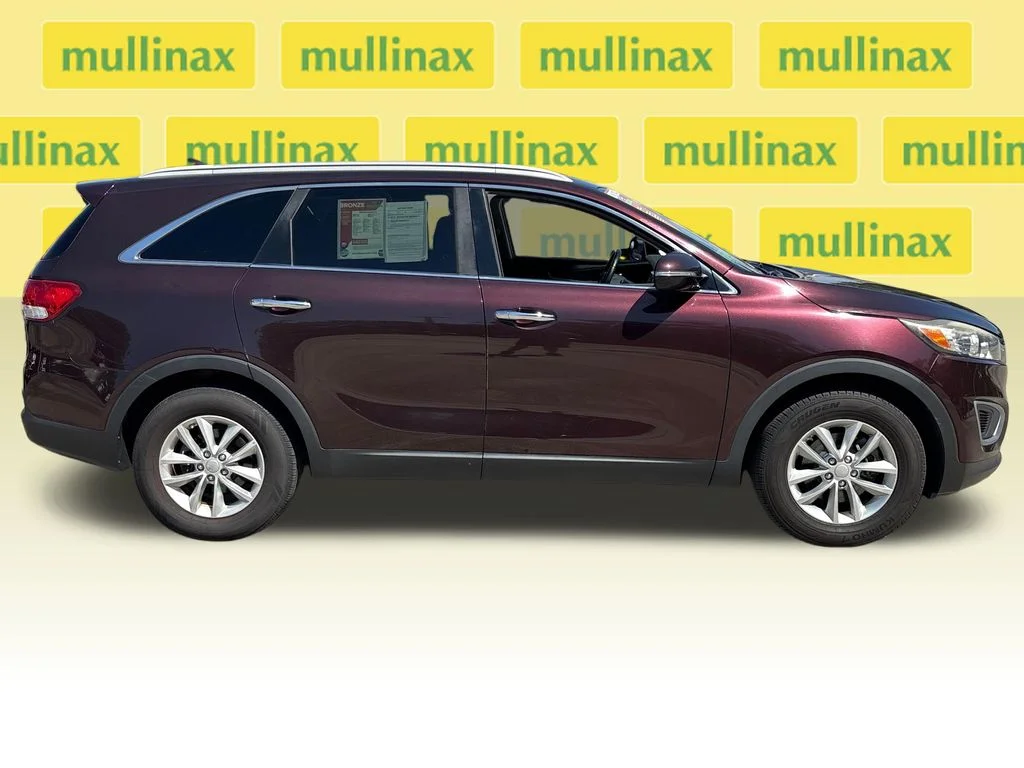 Used 2016 Kia Sorento LX with VIN 5XYPG4A37GG082291 for sale in New Smyrna Beach, FL