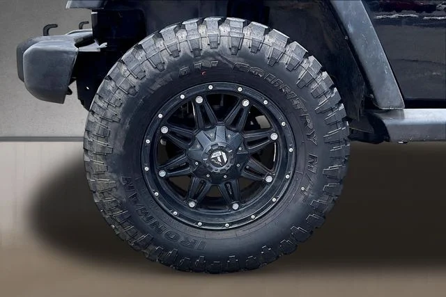 Used 2013 Black Jeep Unlimited Sport image 6