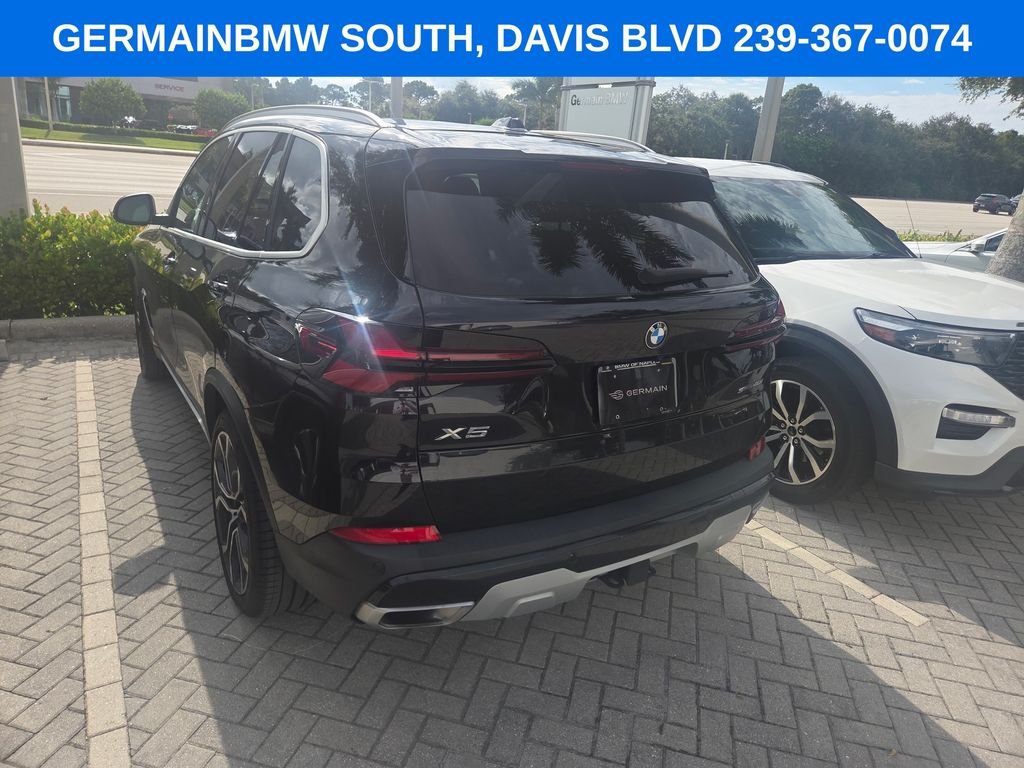 Certified Used 2024 Black Sapphire Metallic BMW sDrive40i image 7