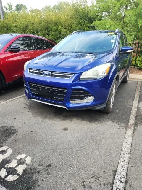 Used 2014 Blue Ford Titanium image 1