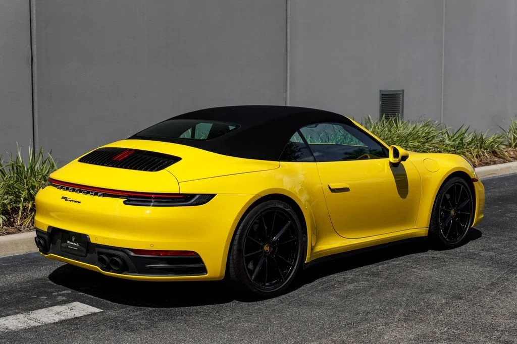 Used 2022 Racing Yellow Porsche Carrera image 5