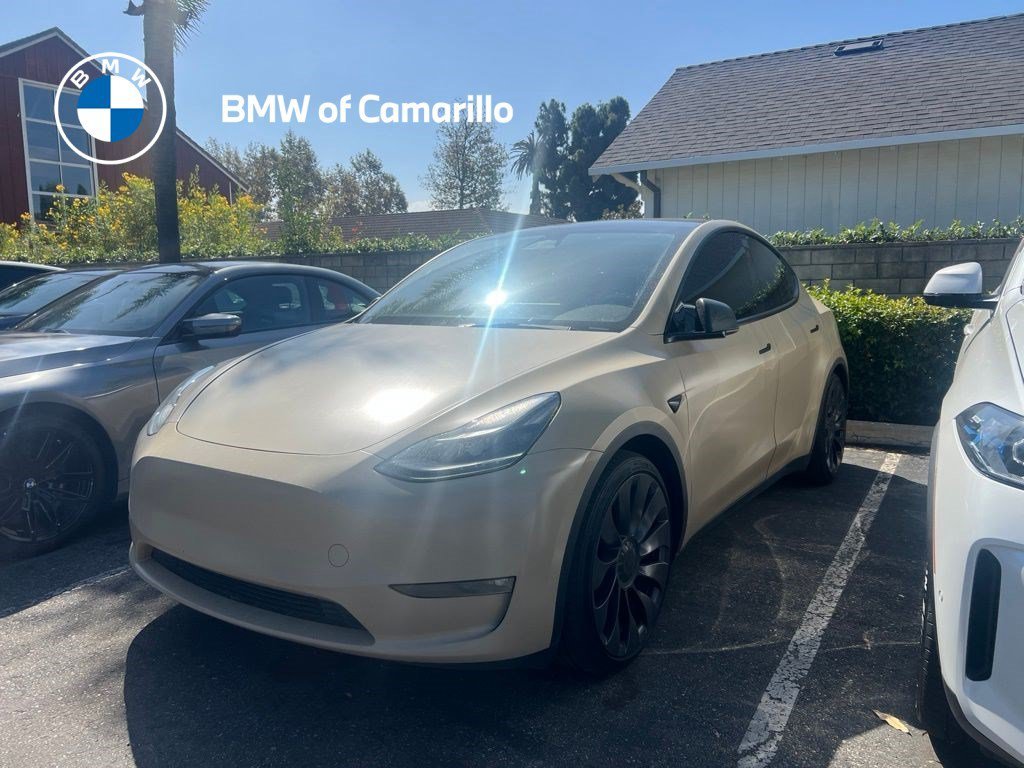 Used 2023 Solid Black Tesla Performance image 1