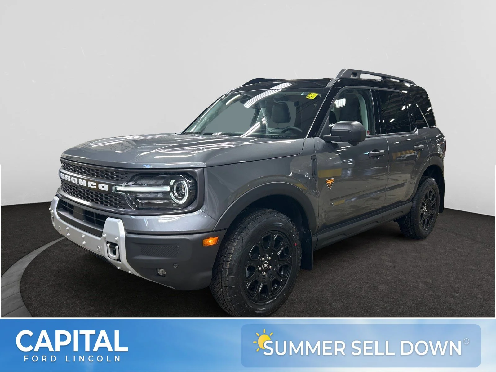 New 2026 Carbonized Grey Metallic Ford Badlands image 1