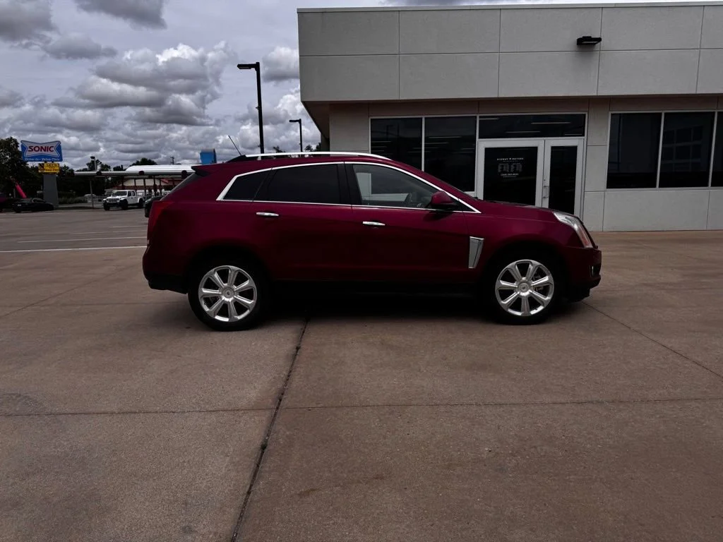 Used 2015 Cadillac SRX Performance Collection with VIN 3GYFNCE39FS576987 for sale in Newton, KS