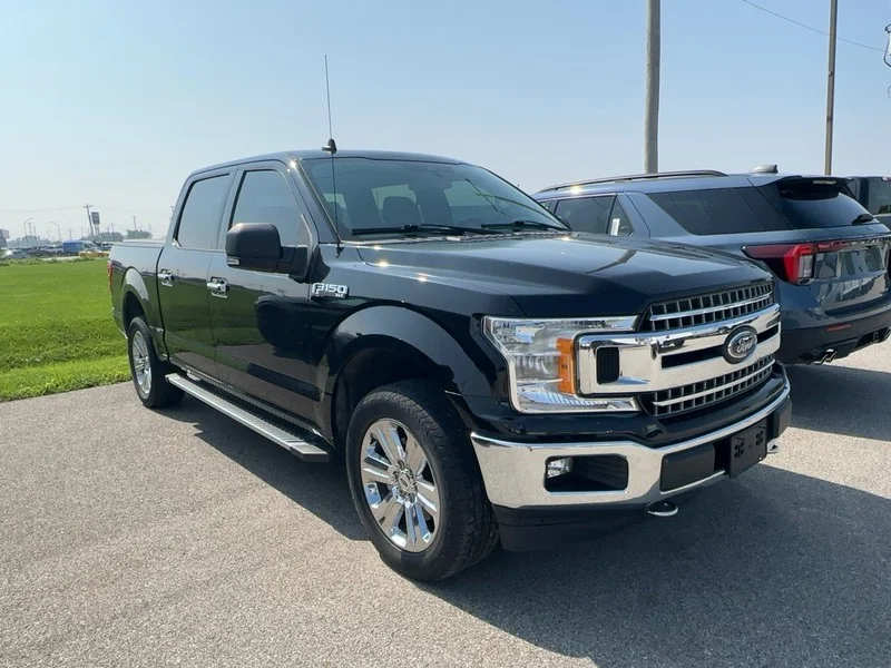 Used 2020 Agate Black Metallic Ford XLT 4WD SuperCrew 5.5