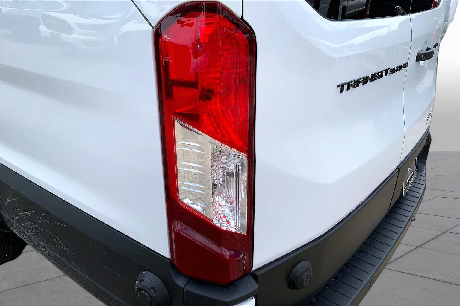 New 2026 Oxford White Ford Passenger Van XLT image 14