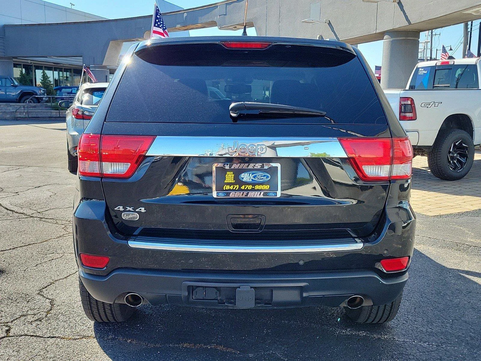 Used 2013 Brilliant Black Crystal Pearl Jeep Overland image 7