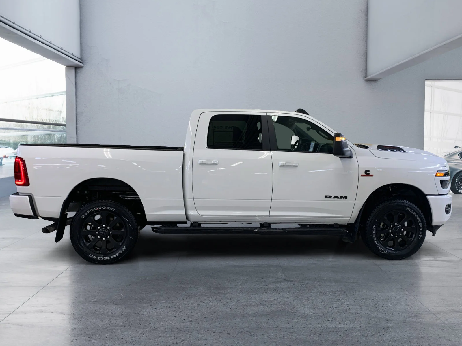 New 2026 Bright White Ram Laramie image 6