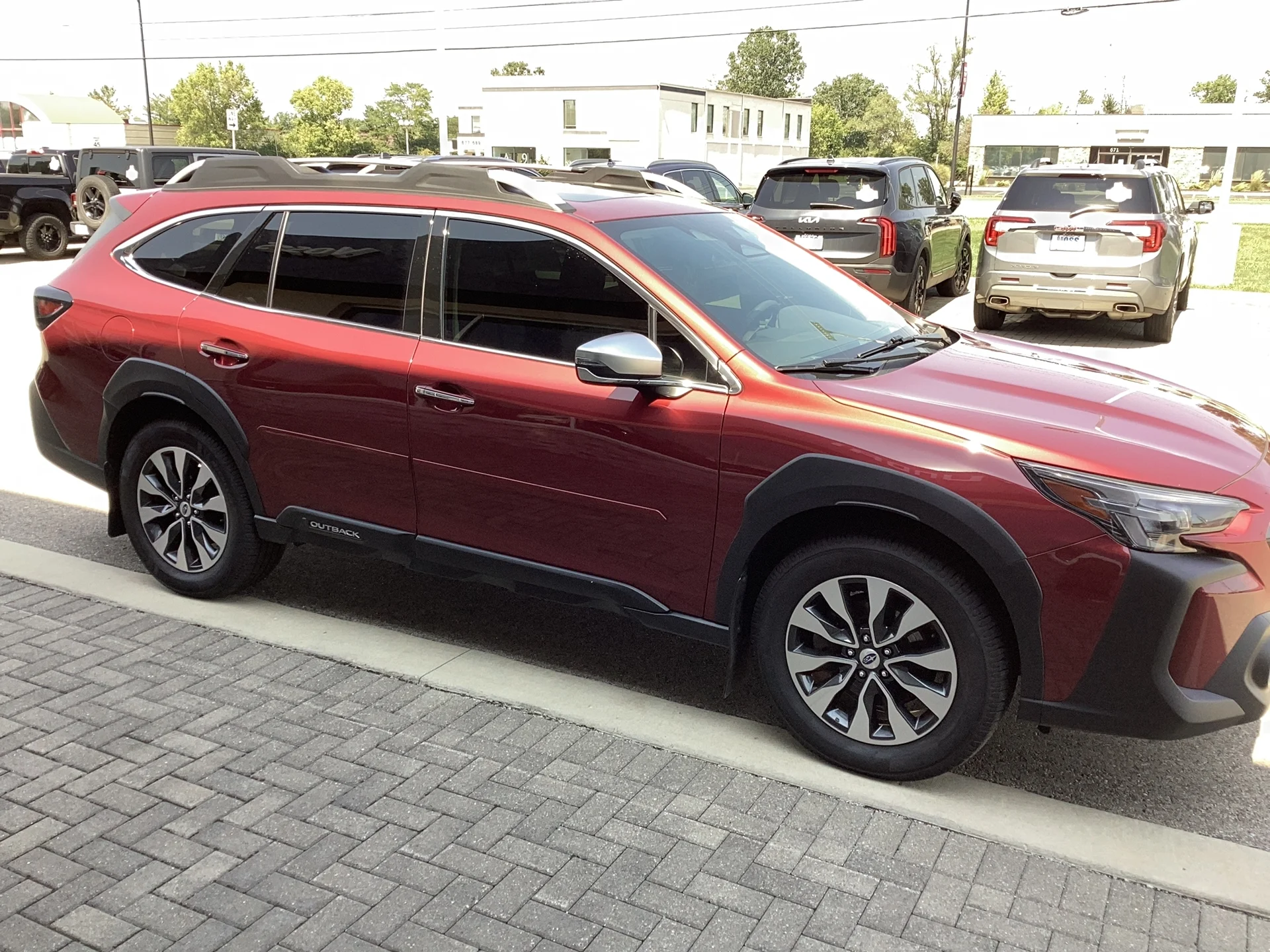 Used 2023 Crimson Red Pearl Subaru Touring XT image 1
